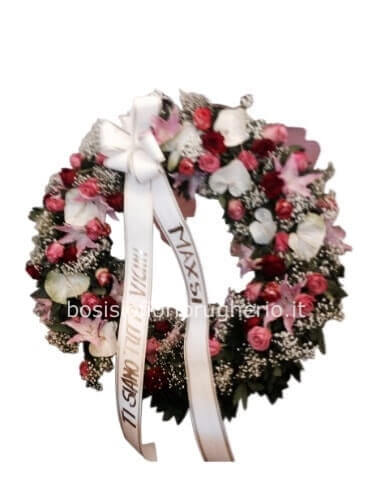 Corona funebre colore tonalità bianca e rosa con fiori assortiti